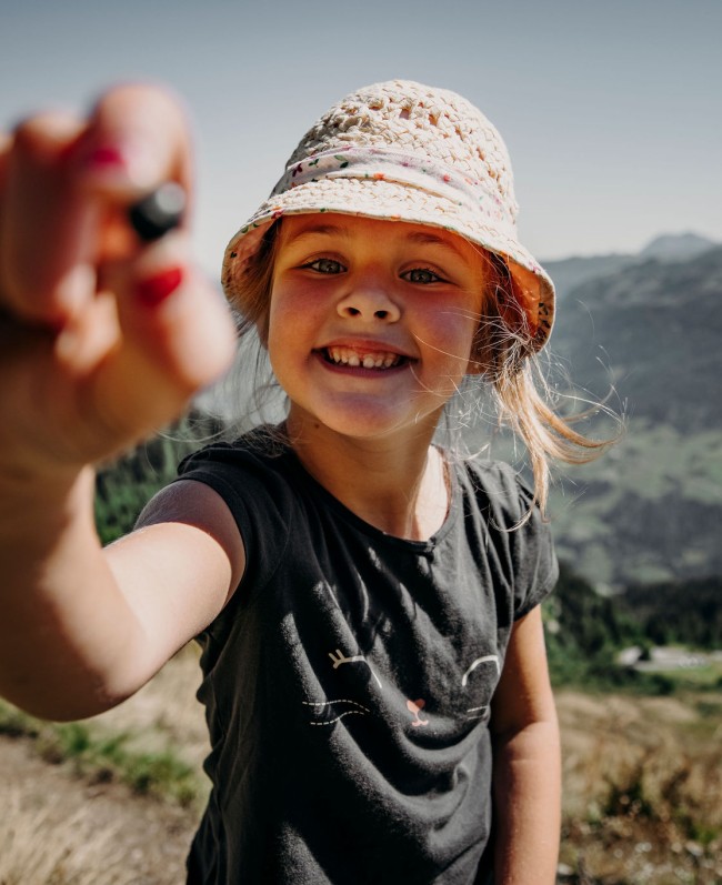 Child on a mountain adventure tour